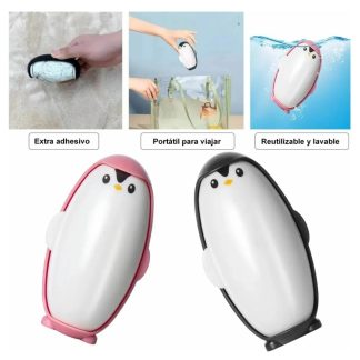 Mini quita pelusa en forma de pingüino