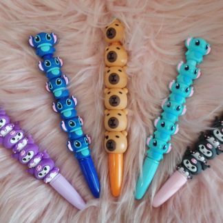 Pluma giratoria  de personajes